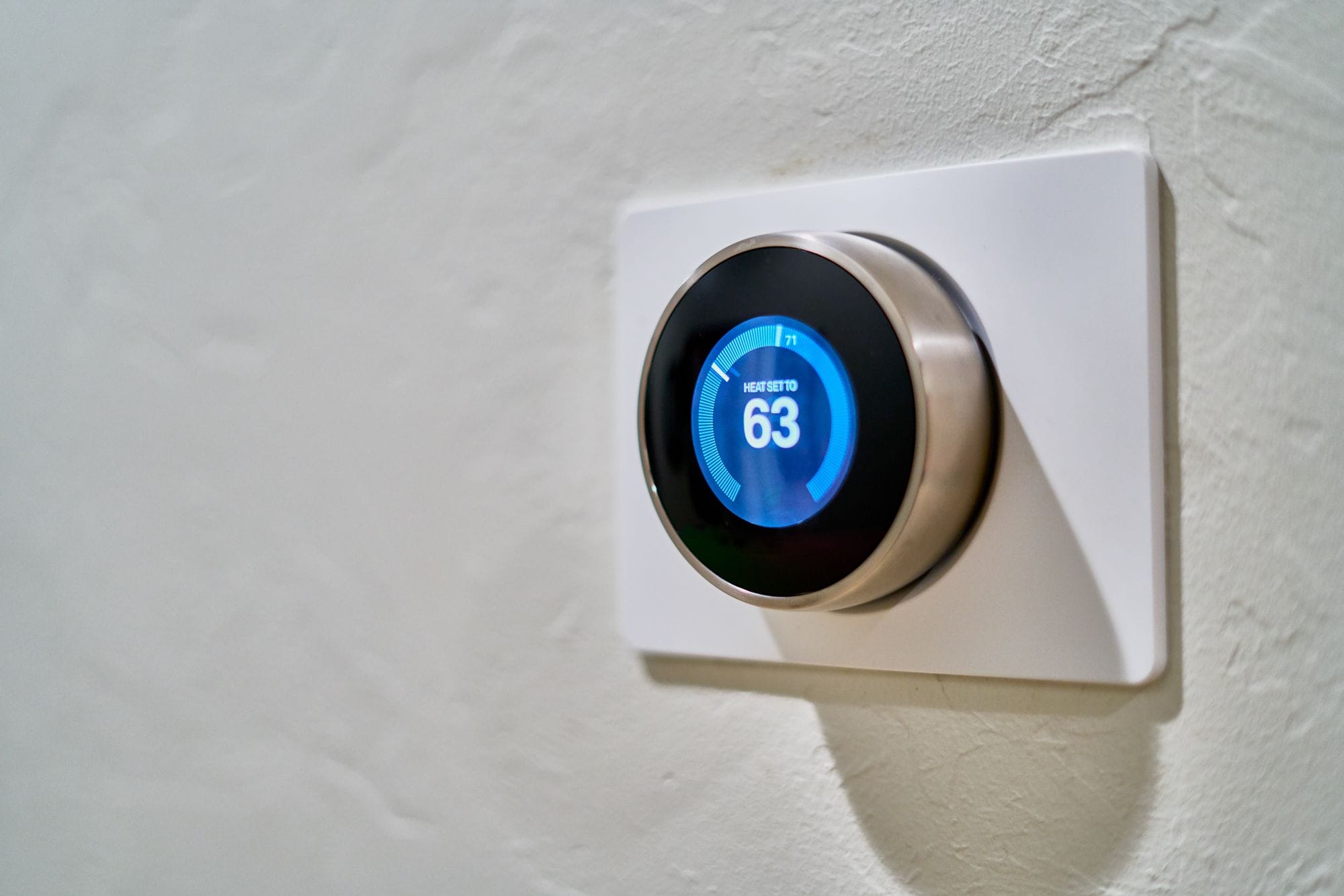 Nest thermostat on a wall
