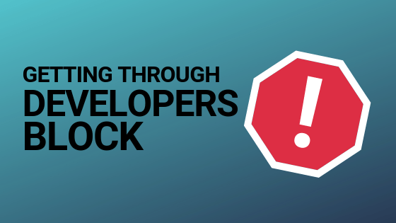Stop sign with blog article title 'getting through developers block'