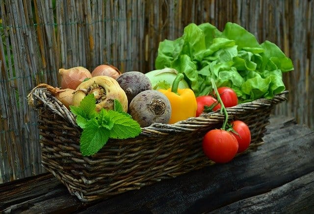 A wicker basket full of fresh fruit